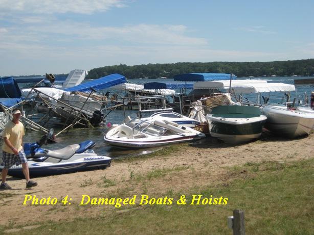 Boats and Hoists damaged and beached.