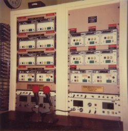Broadcast equipment for KIH-20 Huntsville and KIH-57 Florence.  Broadcast segments would be recorded on tapes, whcih were inserted into tape decks seen here.