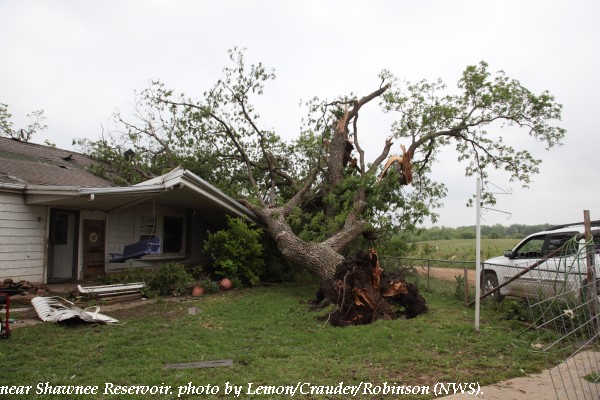 Tree and house damage west of Shawnee, OK.