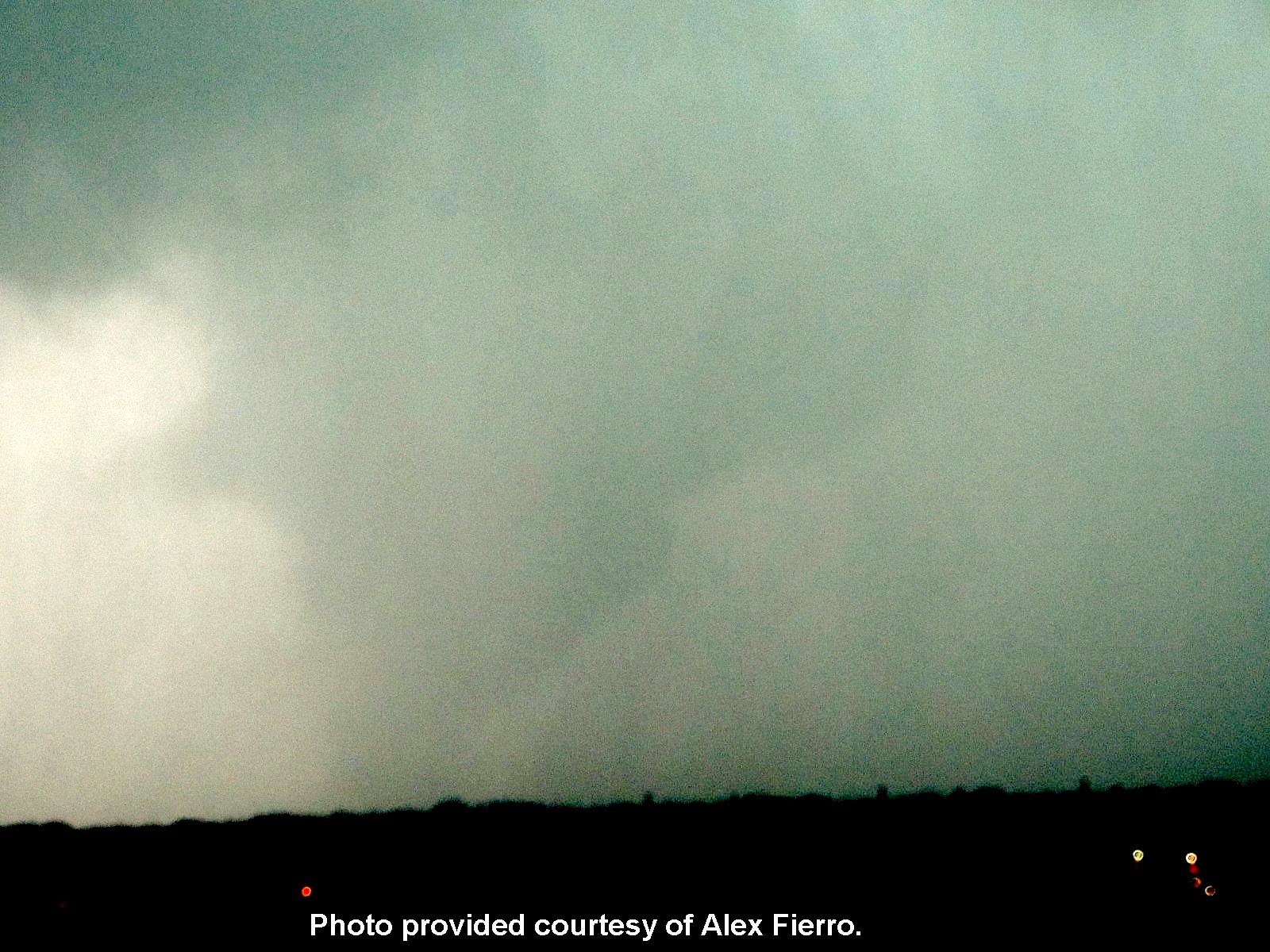 Photo of the April 13, 2012 Norman, Oklahoma Tornado taken from the observatory deck of the National Weather Center by Alex Fierro.