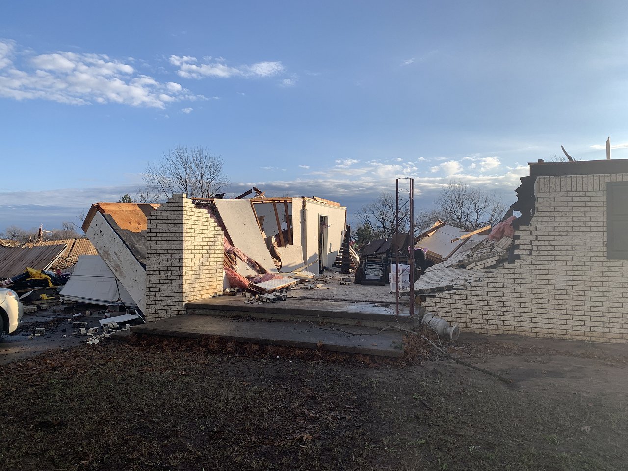 December 13, 2022 - Photo of a damaged home and a workshop about 1 mile north-northeast of Wayne, OK along Nicholas Drive