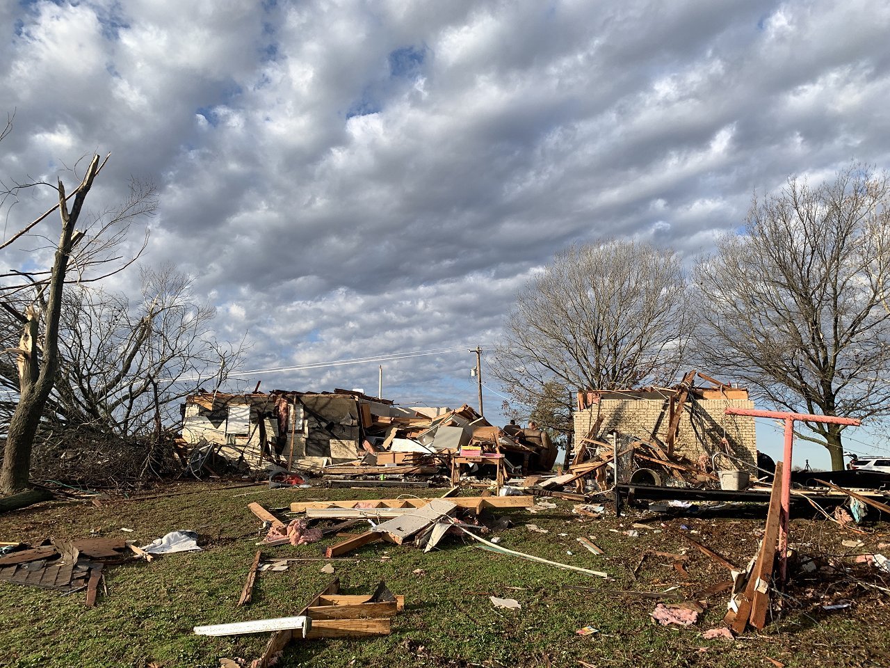 December 13, 2022 - Photo of a damaged home and a workshop about 1 mile north-northeast of Wayne, OK along Nicholas Drive